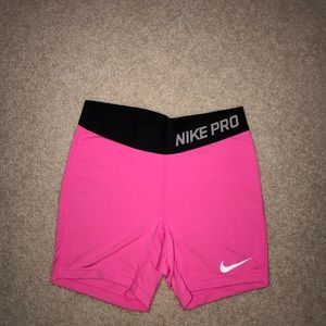 Hot pink nike pros